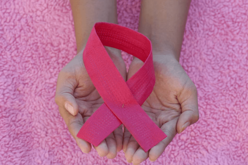 Breast cancer symptoms in women including breast lump, nipple changes, and skin dimpling
